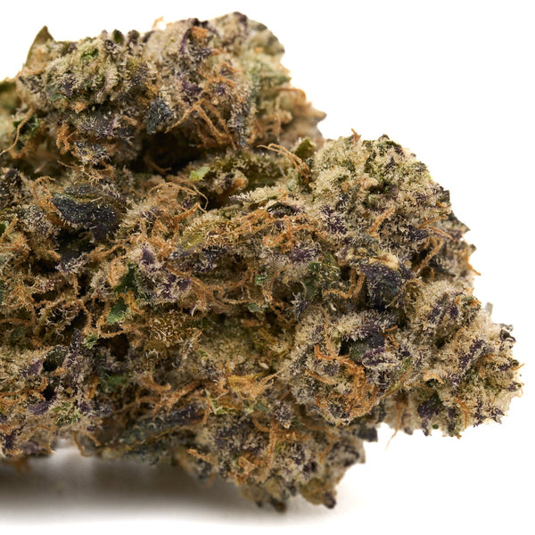 Dense cannabis bud with purple hues from Pineapple Rainbow Indoor THCa Flower